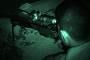 Commander using a Rangemaster at night